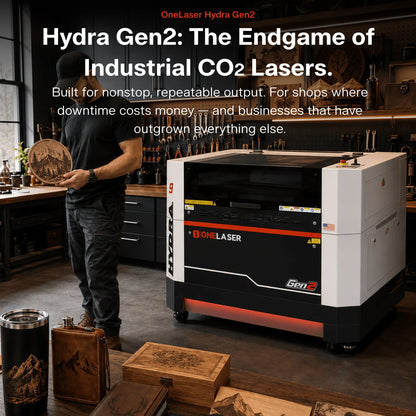 A One Laser Hydra Gen2 industrial CO2 laser engraver shown in a workshop setting, with a man standing nearby and promotional text overlaid on the left side of the image.