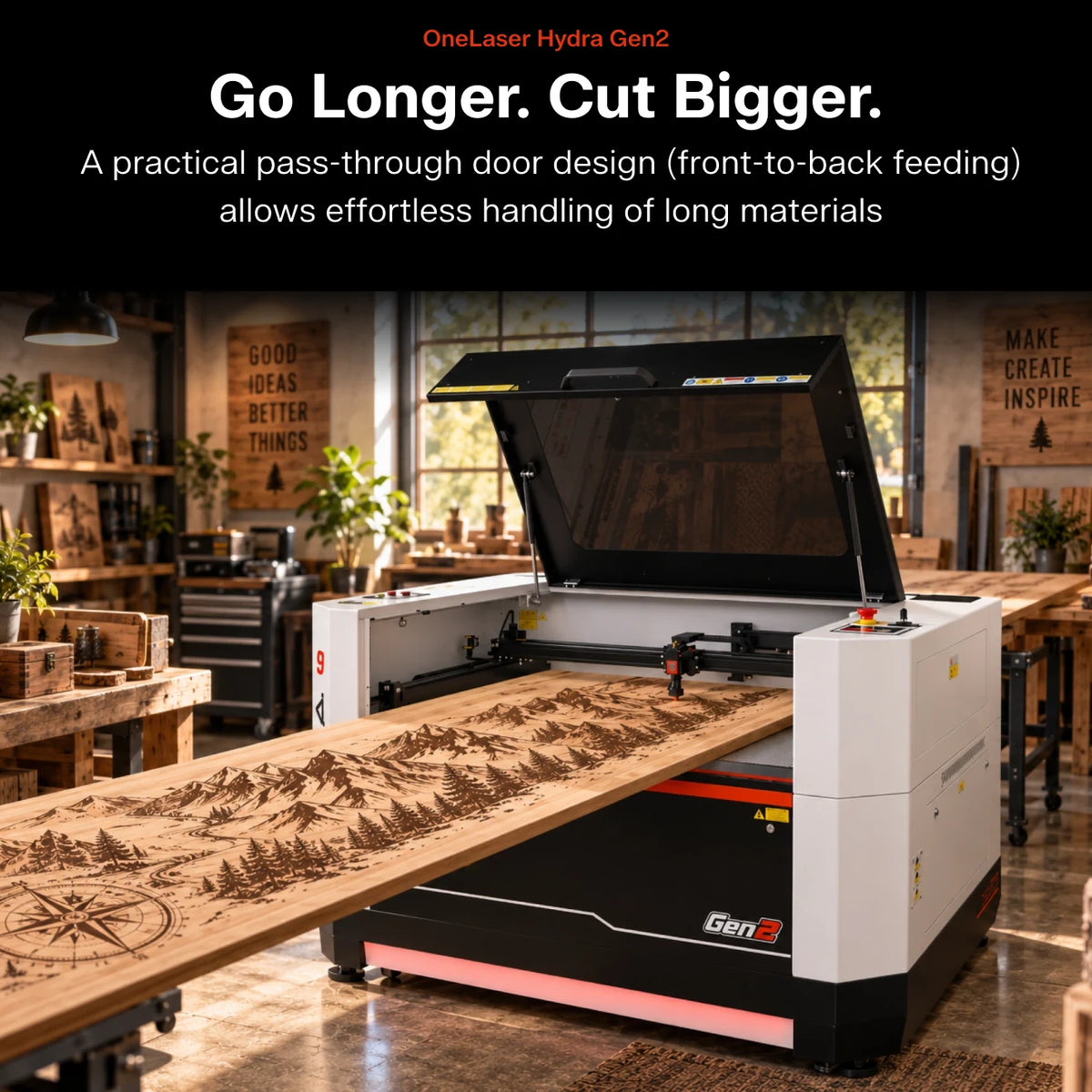 A large OneLaser Hydra Gen2 laser cutting machine shown in a workshop setting, processing a long wooden board with engraved mountain and compass designs. Text at the top reads 'Go Longer.