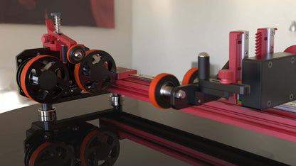 PiBurn V laser rotary attachment on workbench for OneLaser